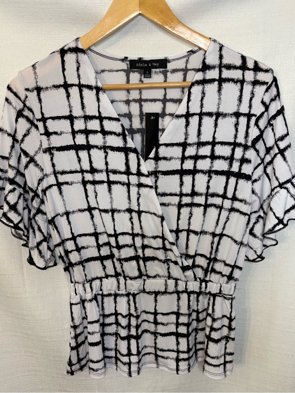 Adele & May Black and White Wrap Peplum Top